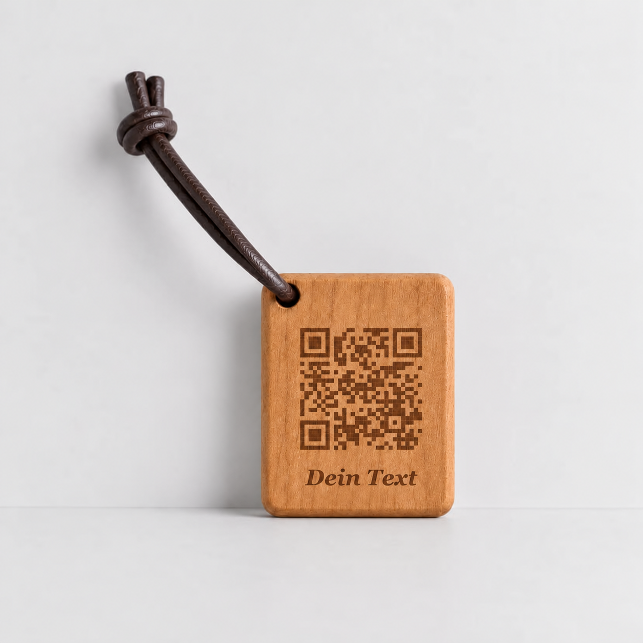 Kontaktanker aus Kirschholz mit QR-Gravur